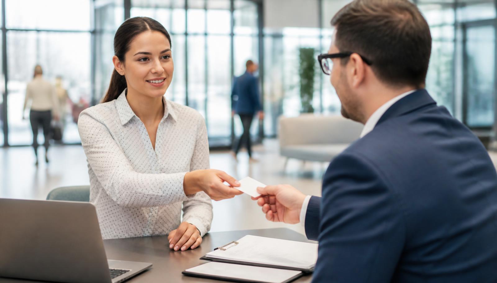 Employee presenting identification during an I-9 verification appointment